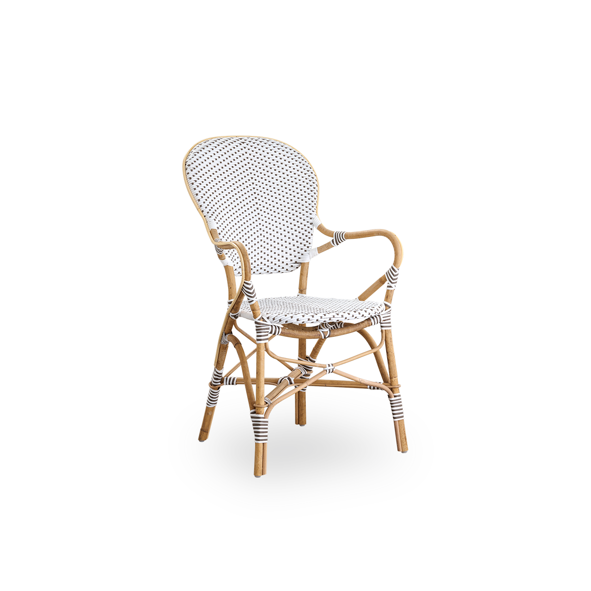 Seitenansicht des Isabell Essstuhls mit Armlehnen. Rattangestell mit Sitz- und Rückenfläche aus weißem ArtFibre mit braunen Punkten. Inspiriert vom Bistrodesign der 1950er Jahre.