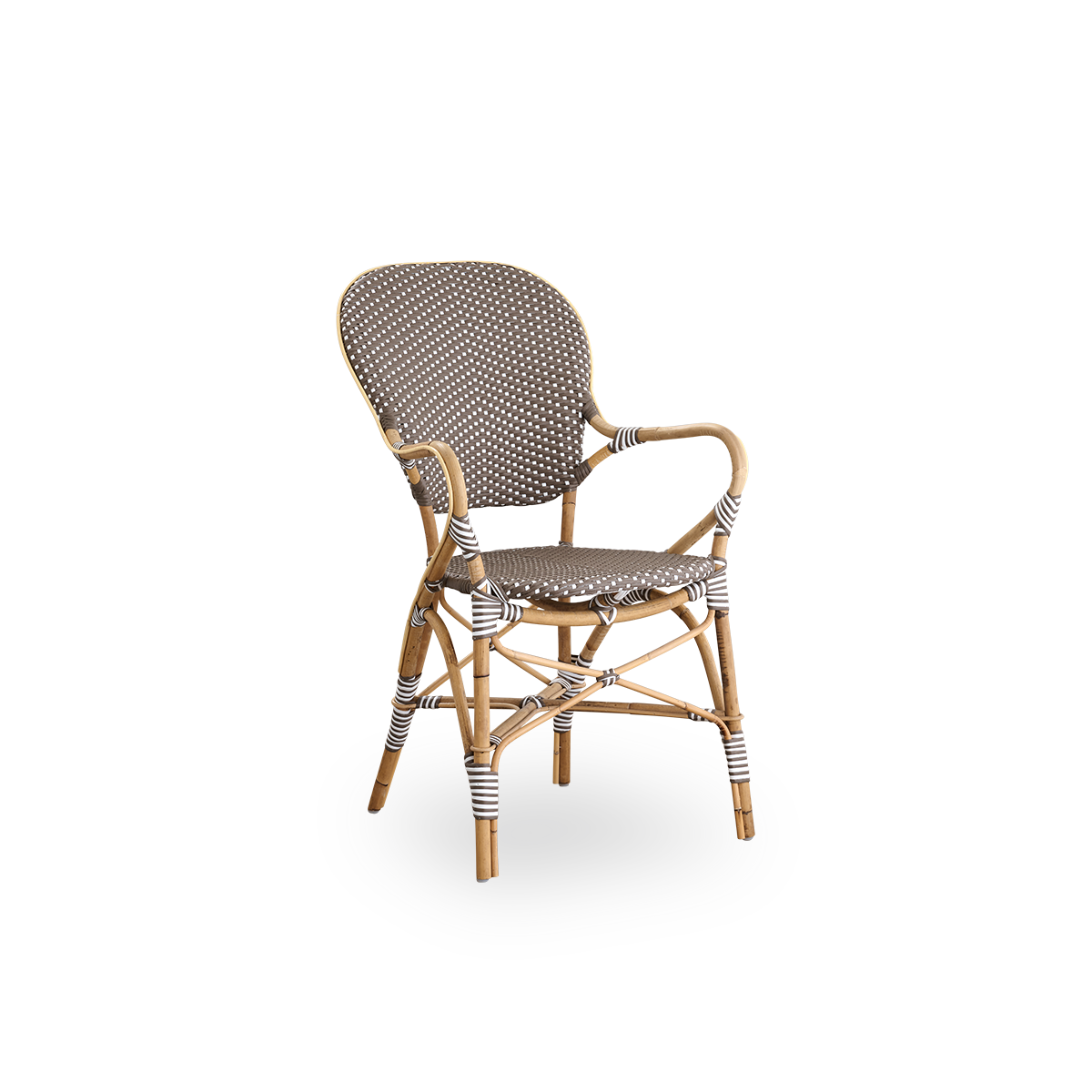 Seitenansicht des Isabell Essstuhls mit Armlehnen. Rattangestell mit Sitz- und Rückenfläche aus braunem ArtFibre mit weißen Punkten. Inspiriert vom Bistrodesign der 1950er Jahre.