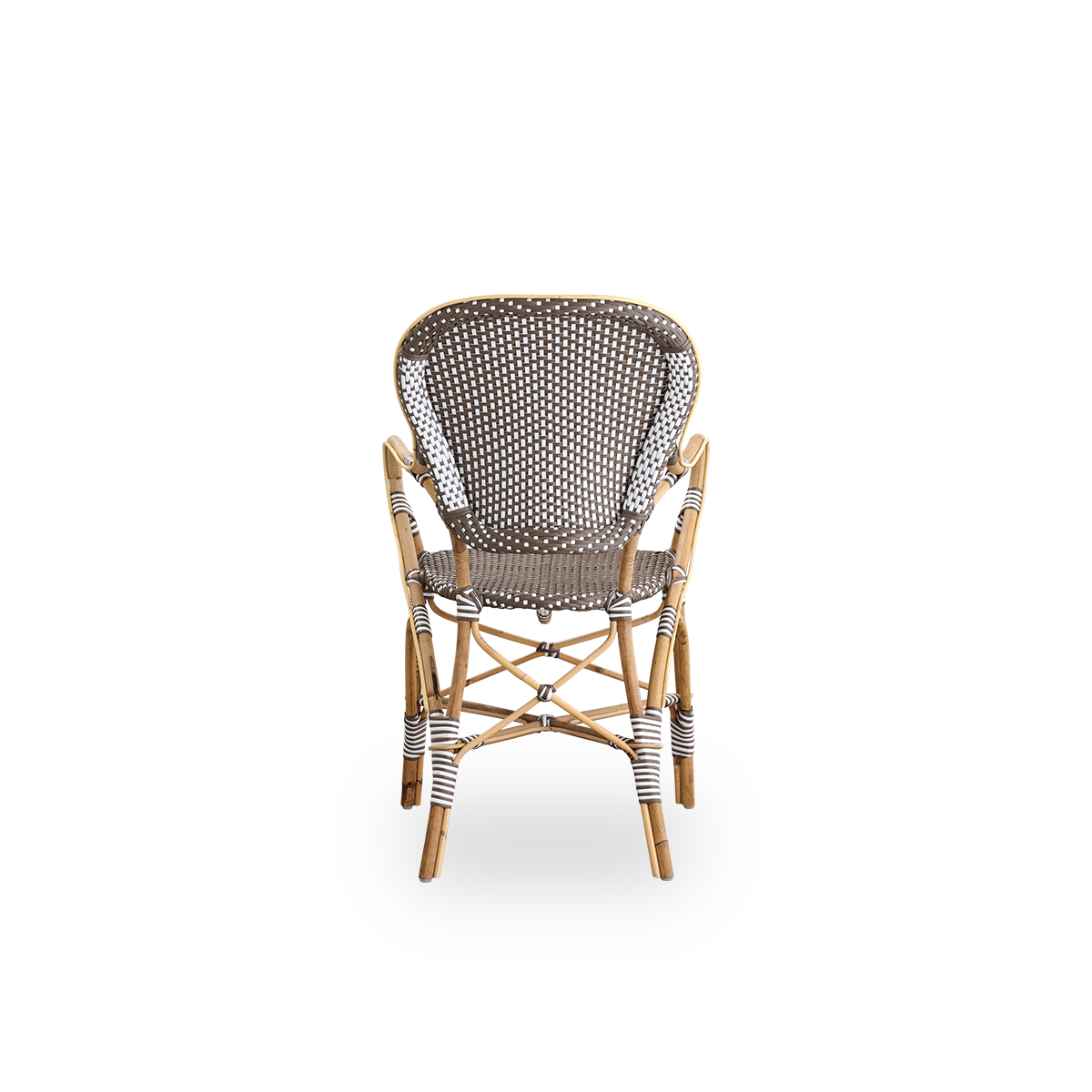 Rückansicht des Isabell-Essstuhls mit Armlehnen. Rattanrahmen mit Sitz und Rückenlehne aus braunem ArtFibre mit weißen Punkten. Inspiriert vom Bistrodesign der 1950er-Jahre.