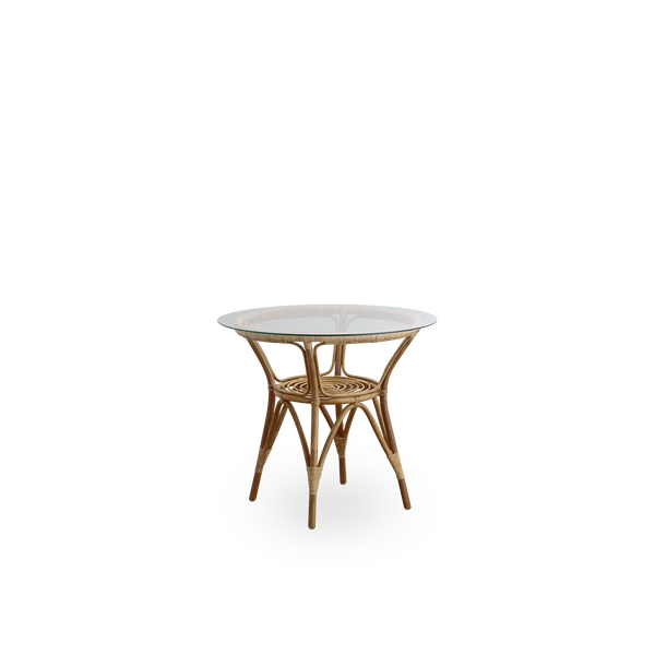 Seitenansicht des Tony Rattan-Café-Tisches in Antique Brown mit 8 mm gehärteter Glasplatte. Rattanrahmen handgefertigt aus hochwertigem indonesischem Rattan.