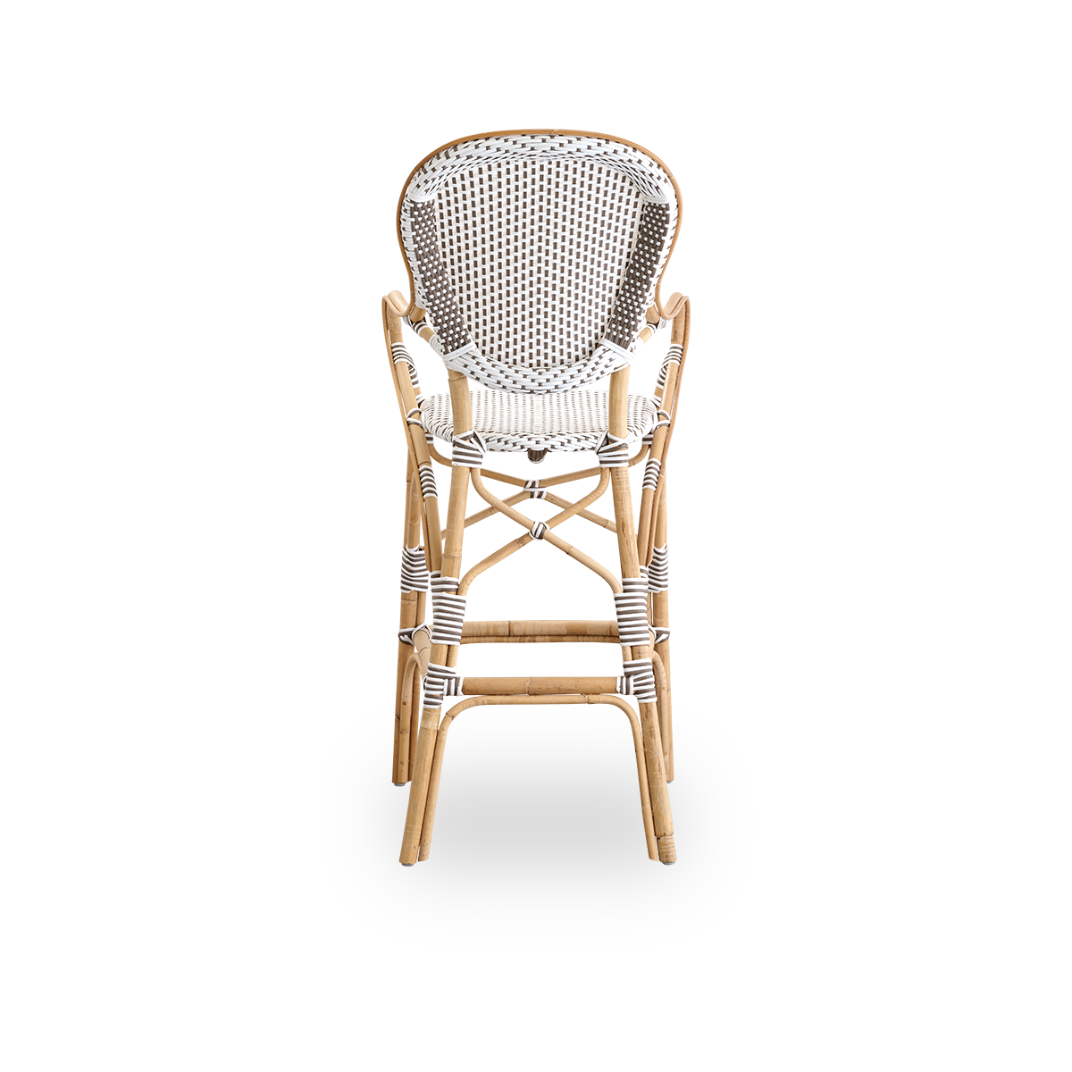 Rückansicht des Isabell-Barhockers mit hoher Rückenlehne, Armlehnen und Fußstütze. Rahmen aus natürlichem Rattan mit Sitzfläche aus ArtFibre in Weiß mit cappuccinofarbenen Punkten. Inspiriert vom Bistrodesign der 1950er-Jahre.