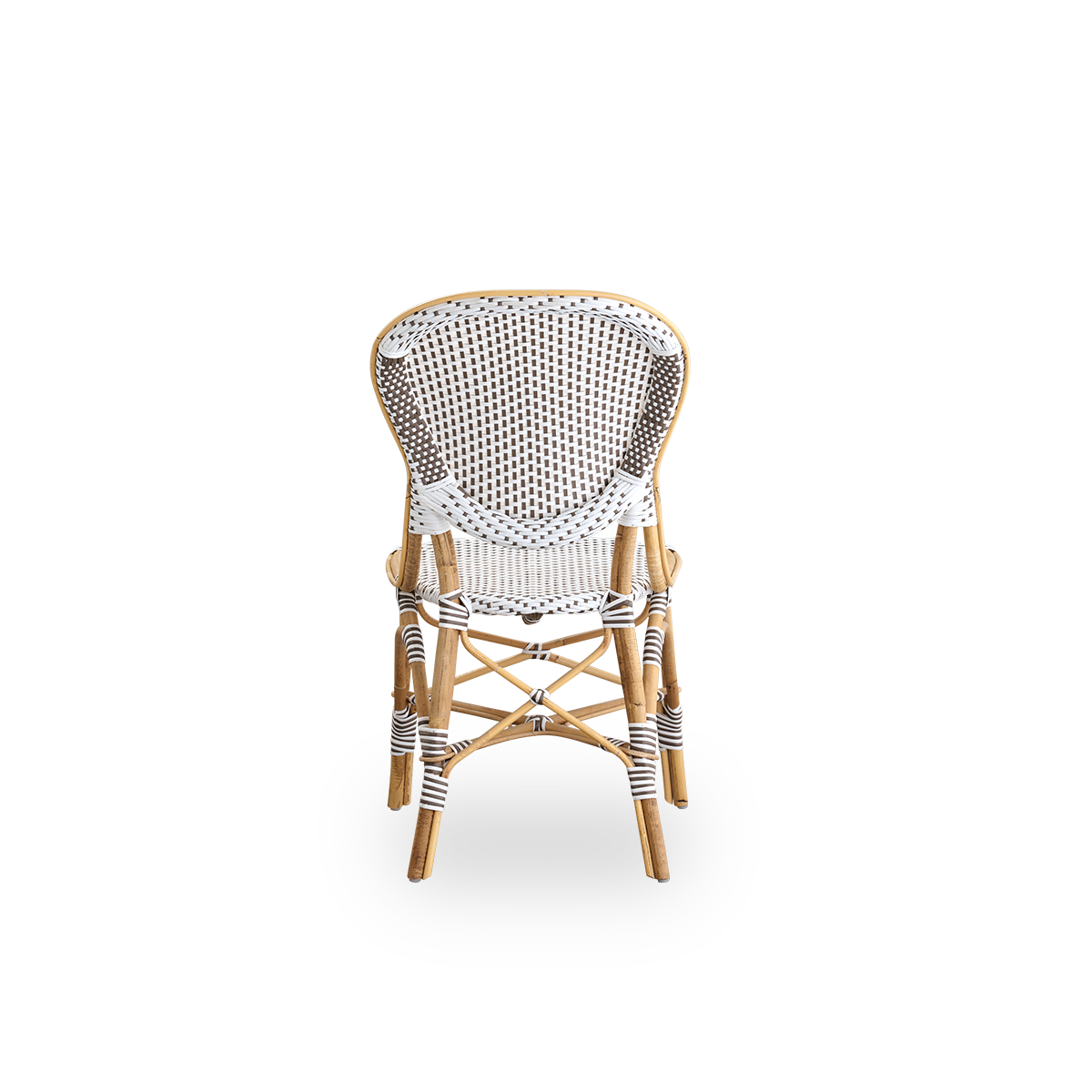 Rückansicht des Isabell-Essstuhls. Rattanrahmen mit Sitz und Rückenlehne aus weißem ArtFibre mit braunen Punkten. Inspiriert vom Bistrodesign der 1950er-Jahre.