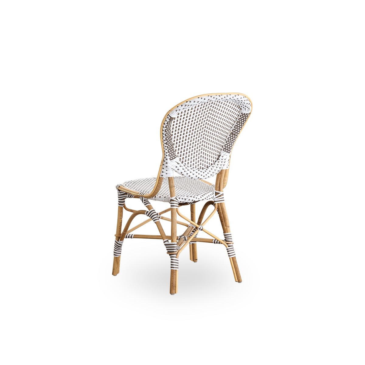 Rückansicht des Isabell Esszimmerstuhls.
Rattangestell mit Sitz und Rückenlehne aus weißem ArtFibre mit braunen Punkten. Inspiriert vom Bistrodesign der 1950er Jahre.