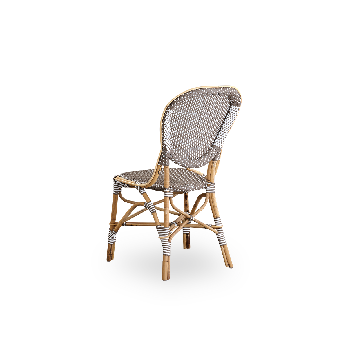 Rückansicht des Isabell Esszimmerstuhls.
Rattangestell mit Sitz und Rückenlehne aus braunem ArtFibre mit weißen Punkten. Inspiriert vom Bistrodesign der 1950er Jahre.