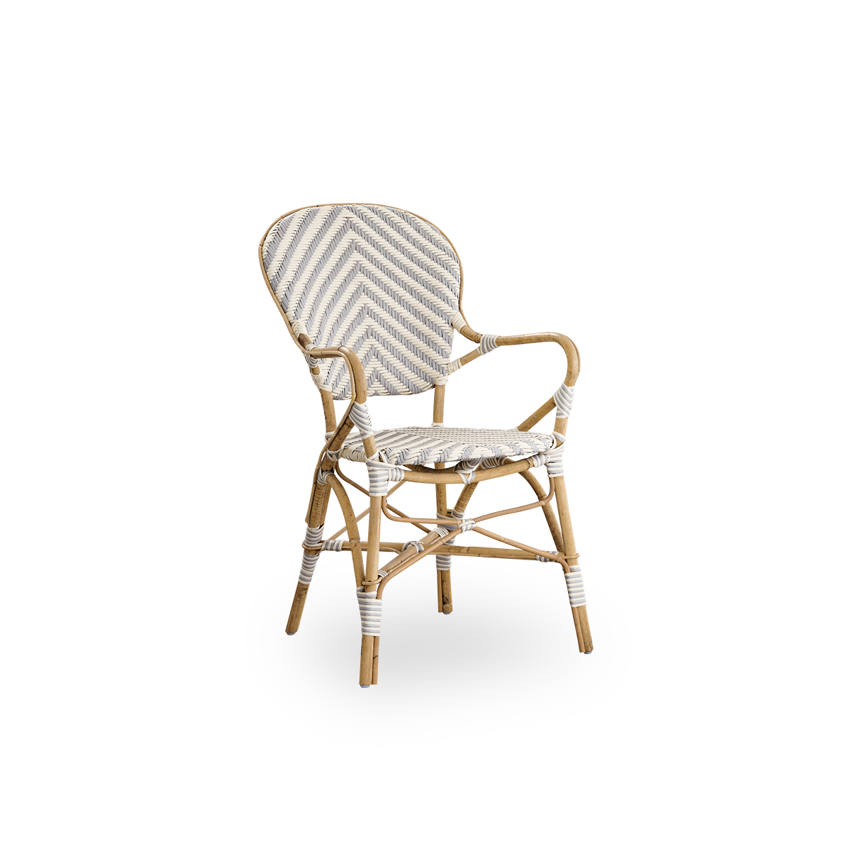 Seitenansicht des Isabell Essstuhls mit Armlehne. Rattangestell mit Sitz- und Rückenfläche aus ArtFibre in Elfenbein- und Grauzickzackmuster. Inspiriert vom Bistrodesign der 1950er Jahre.