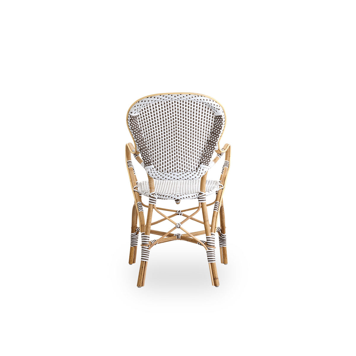 Plain back view of Isabell dining chair with armrest. Rattan frame with seat and backrest made in white ArtFibre with brown dots. Inspired by 1950s bistro design.