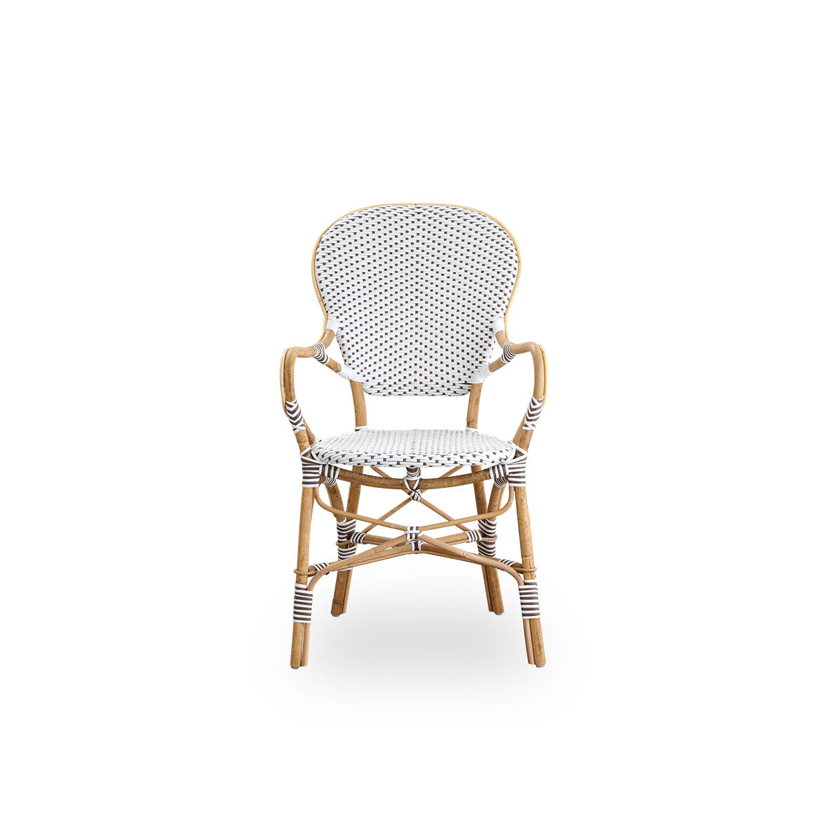 Front view of the Isabell dining chair with armrests.
Rattan frame with seat and backrest made in white ArtFibre with brown dots. Inspired by 1950s bistro design.