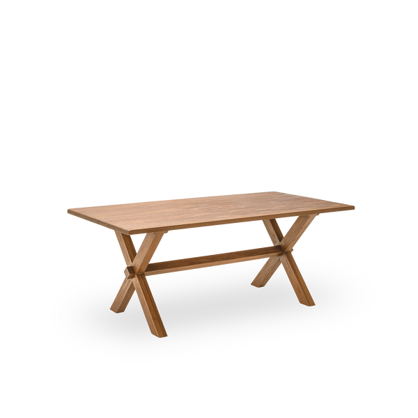 Seitenansicht des Hugo Esstisches, 180x90 cm, aus Teakholz mit natürlicher, patinierter Oberfläche. Oberflächenbehandelt, um die natürliche Maserung des Holzes hervorzuheben, mit Platz für sechs.
