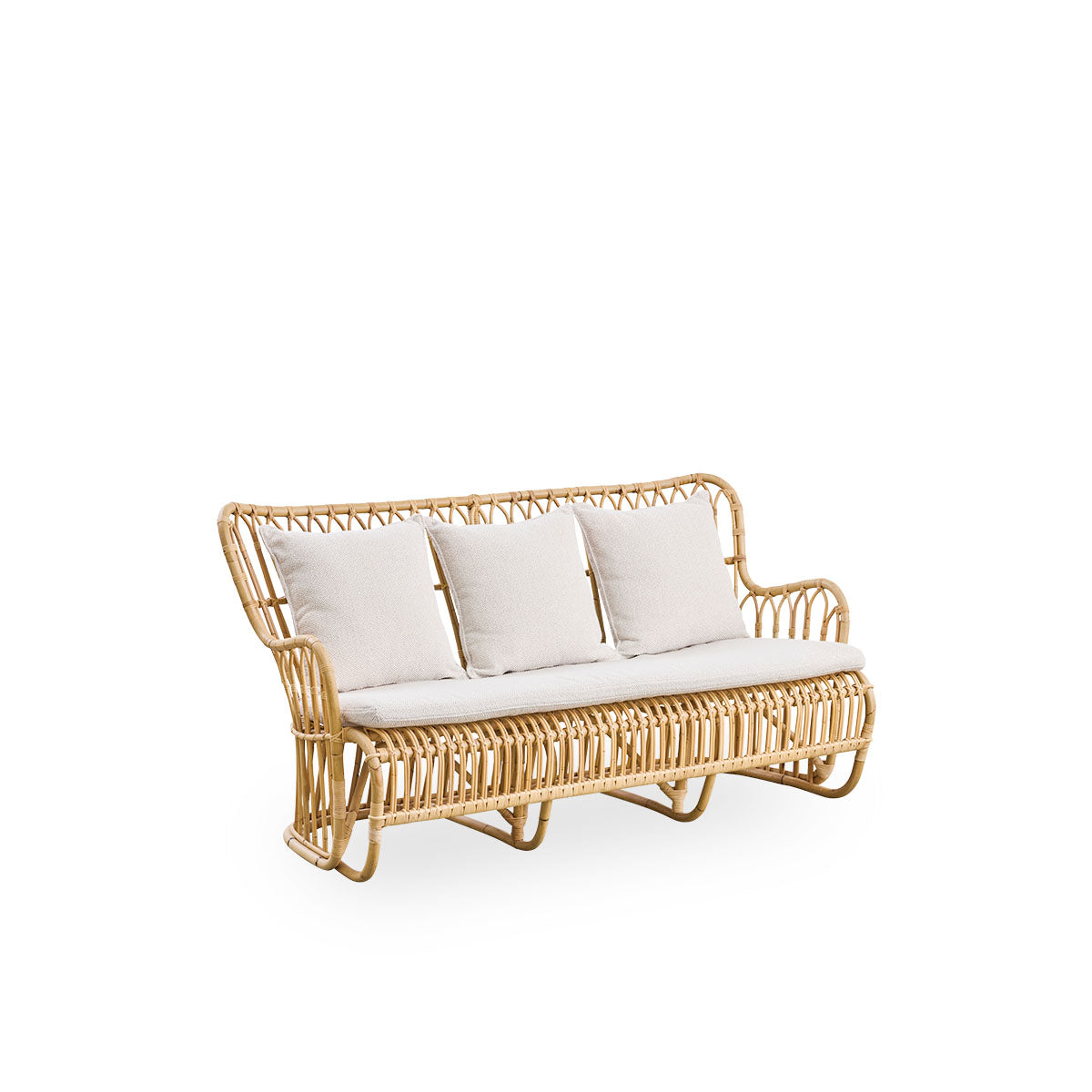 Seitenansicht des Tulip Korbsofas, entworfen von Tove Kindt-Larsen, mit weichen, organischen Linien. Handgefertigt aus hochwertigem indonesischem Rattan.