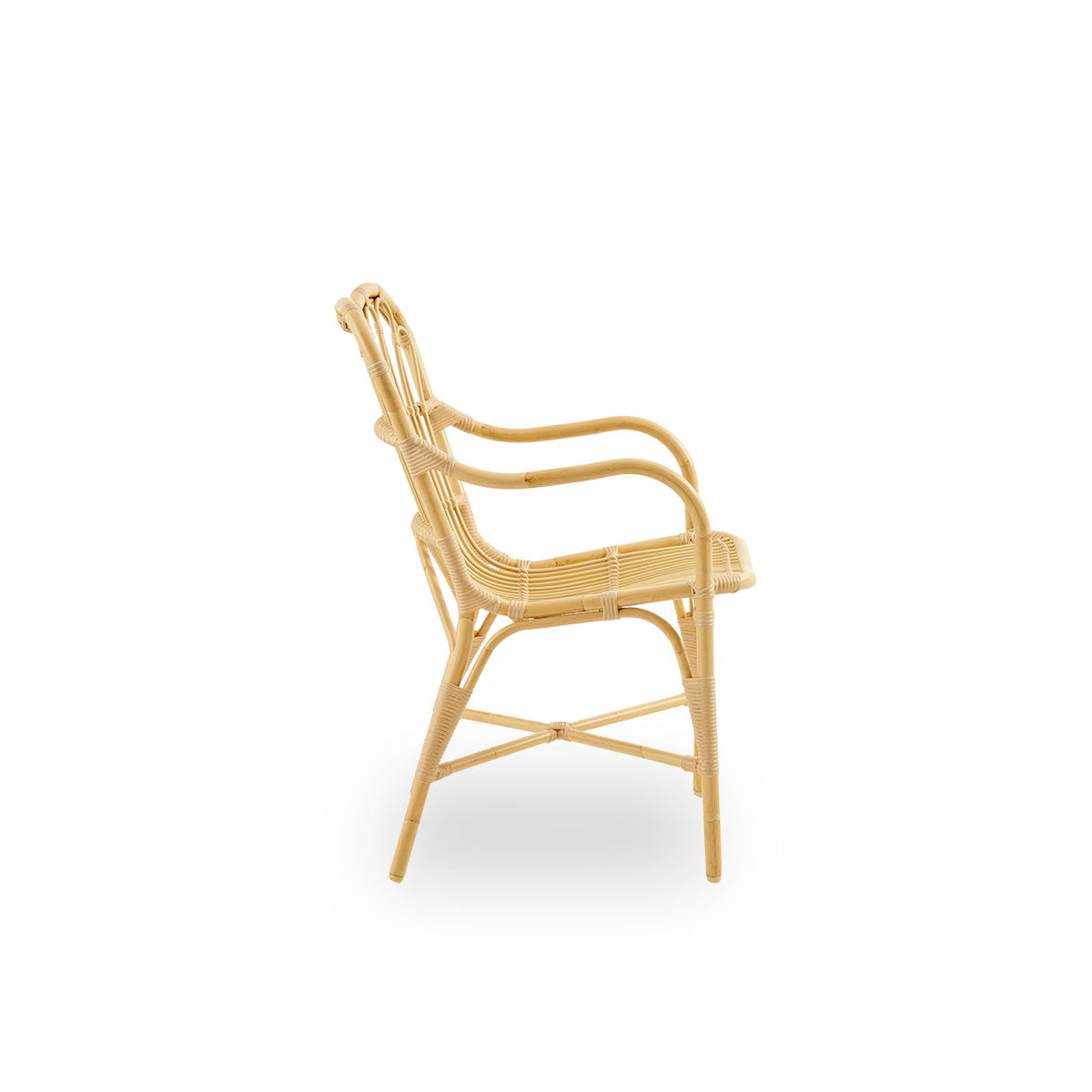 Plain side view of Margret outdoor dining chair with high wide backrest and curved armrests. Aluminium frame in natural rattan look with ArtFibre windings.  