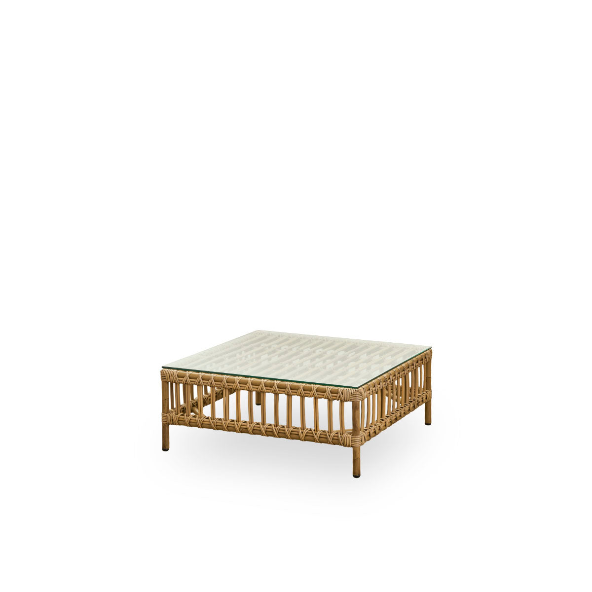 Seitenansicht des Maggie Outdoor-Sofas Pouf-Moduls in Antique-Braun, präsentiert mit Glasplatte zur Nutzung als Beistelltisch. Aluminiumrahmen im handbemalten Rattan-Look mit ArtFibre-Umschlingungen.