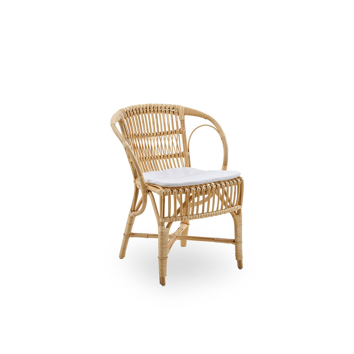 Side view of Robert dining chair in natural color designed by Robert W. Elegant wicker chair handcrafted from high-quality Indonesian rattan.