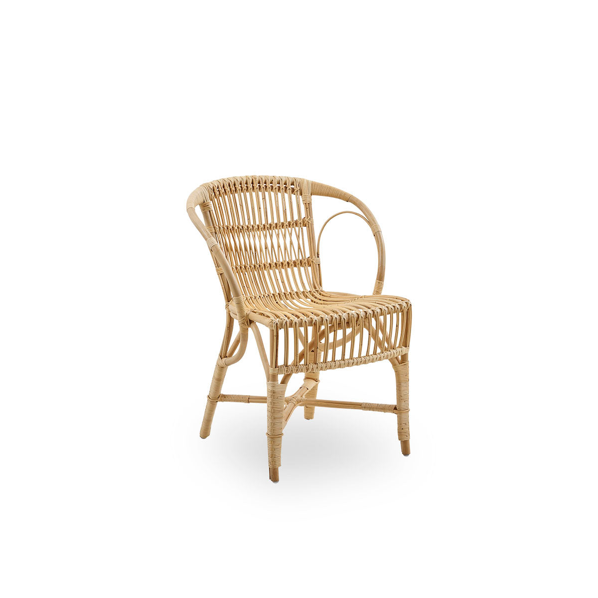 Side view of Robert dining chair in natural color designed by Robert W. Elegant wicker chair handcrafted from high-quality Indonesian rattan.